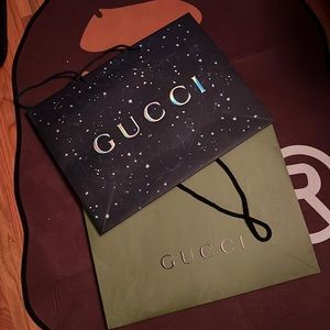 2 medium size Gucci shopping bags